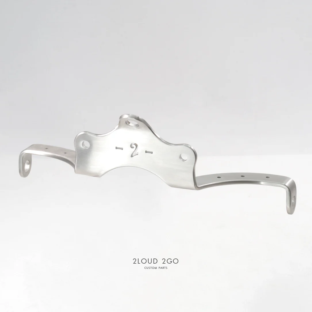 Air-Cooled Triumph Headlight with Turn Signal Bracket
