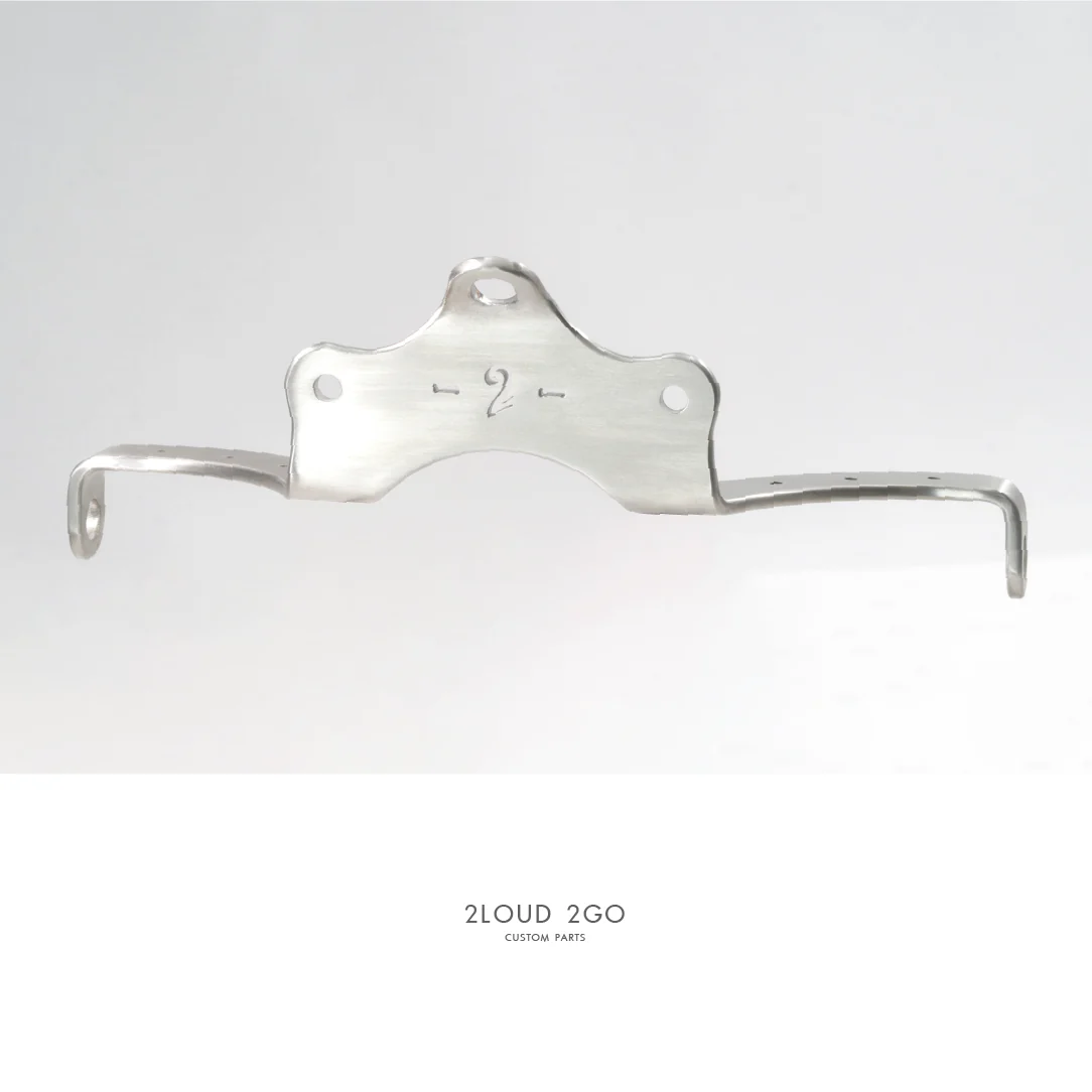 Air-Cooled Triumph Headlight with Turn Signal Bracket