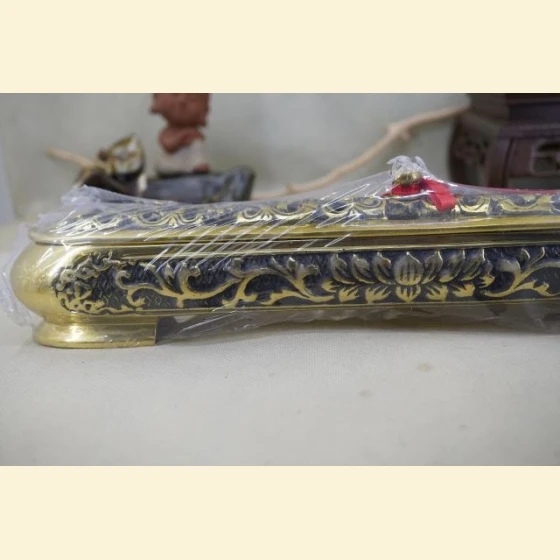 Bronze reclining incense burner (one foot)
