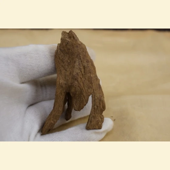 9.79g of red clay from Quang Binh, Vietnam, sinks rapidly.