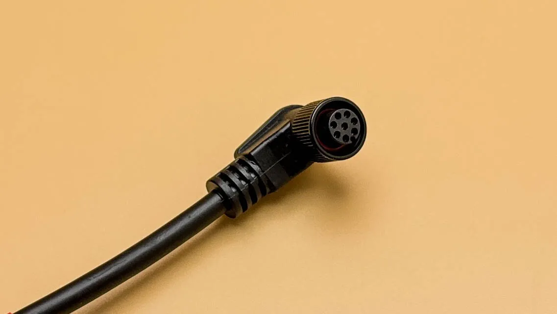 Custom 8-pin DIN connector with black PVC strain relief overmolding