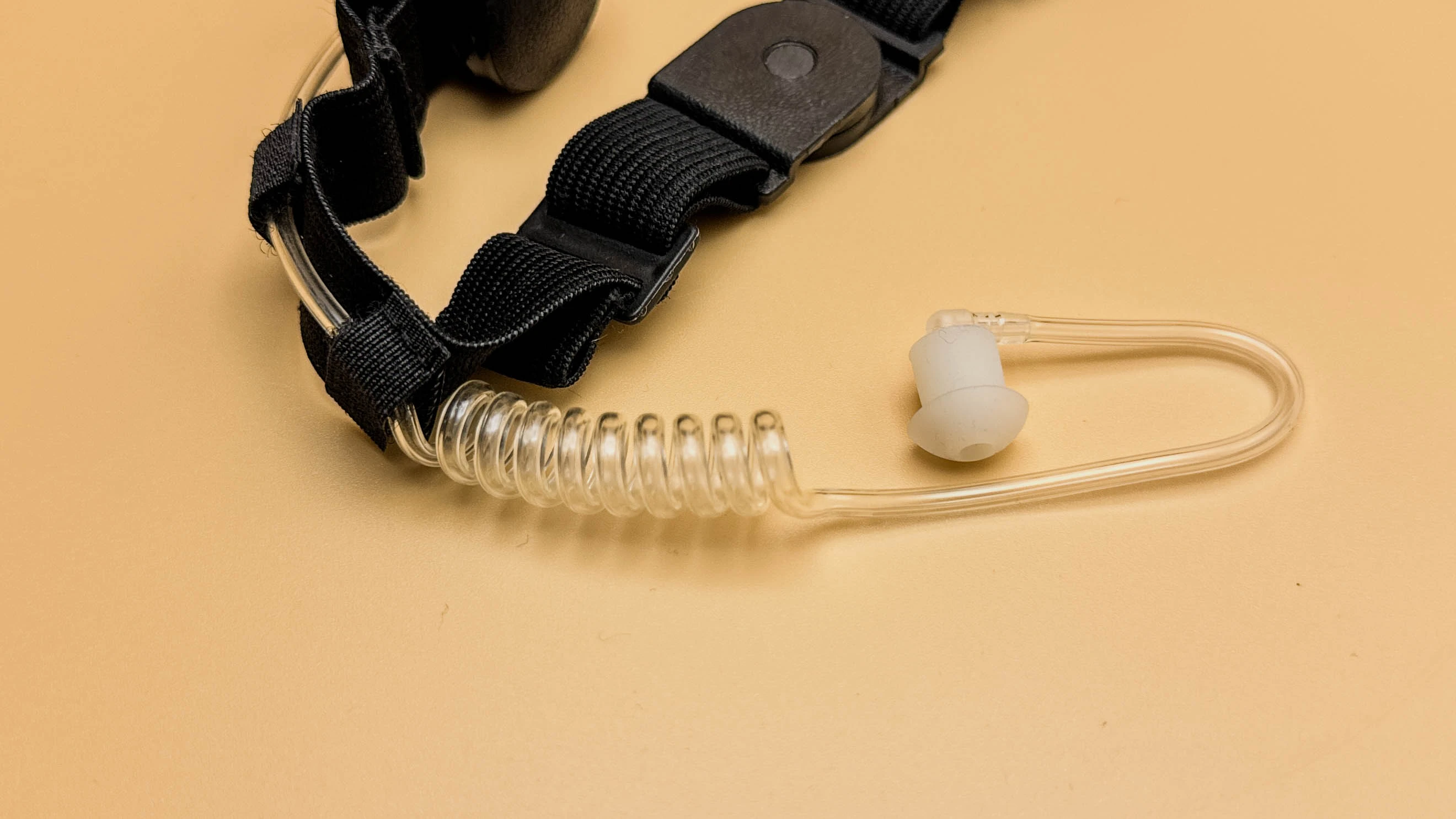 In-ear earphone component for tactical military throat microphone assembly