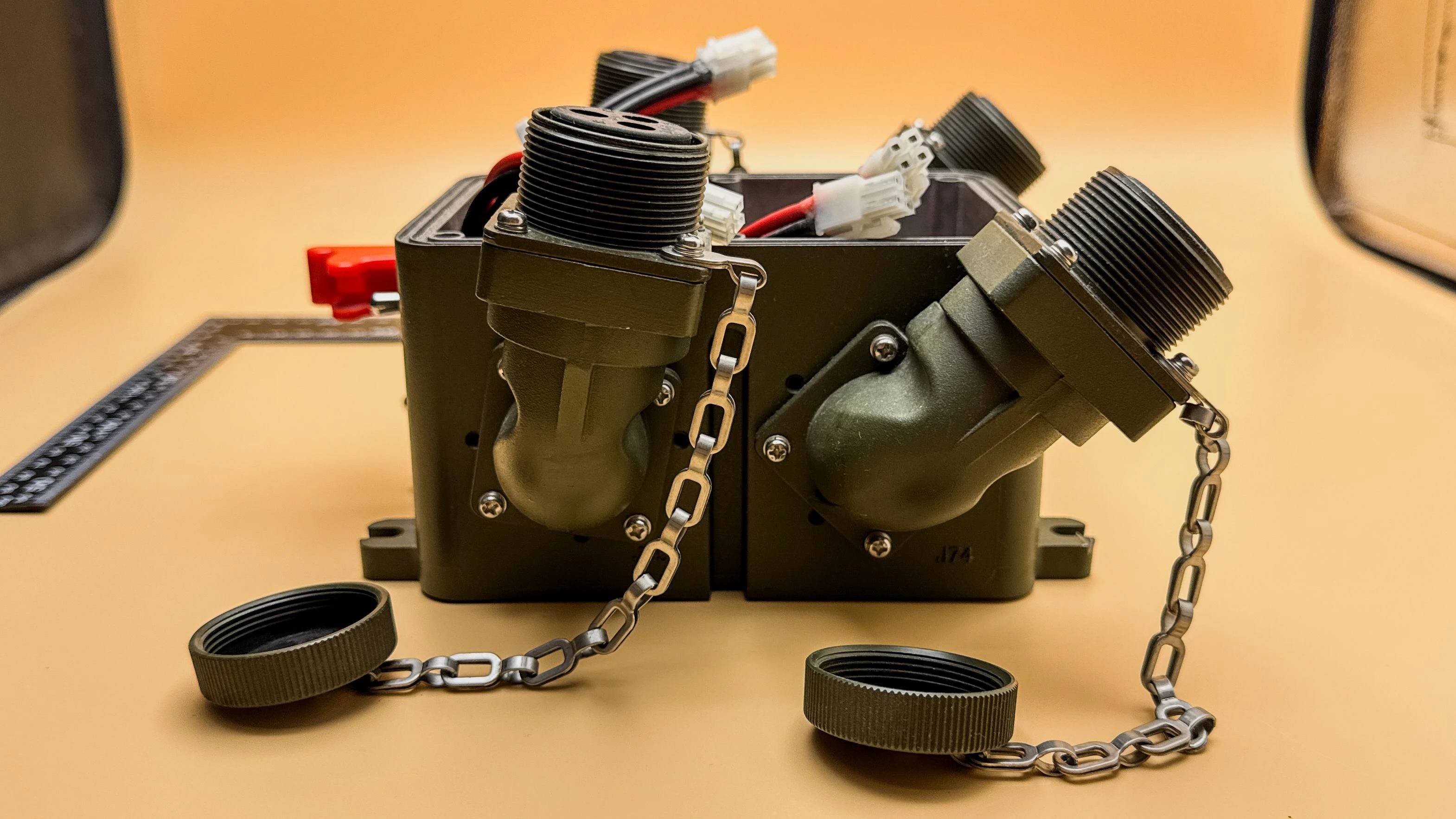 Finished ruggedized tactical power distributor for armored vehicles front view