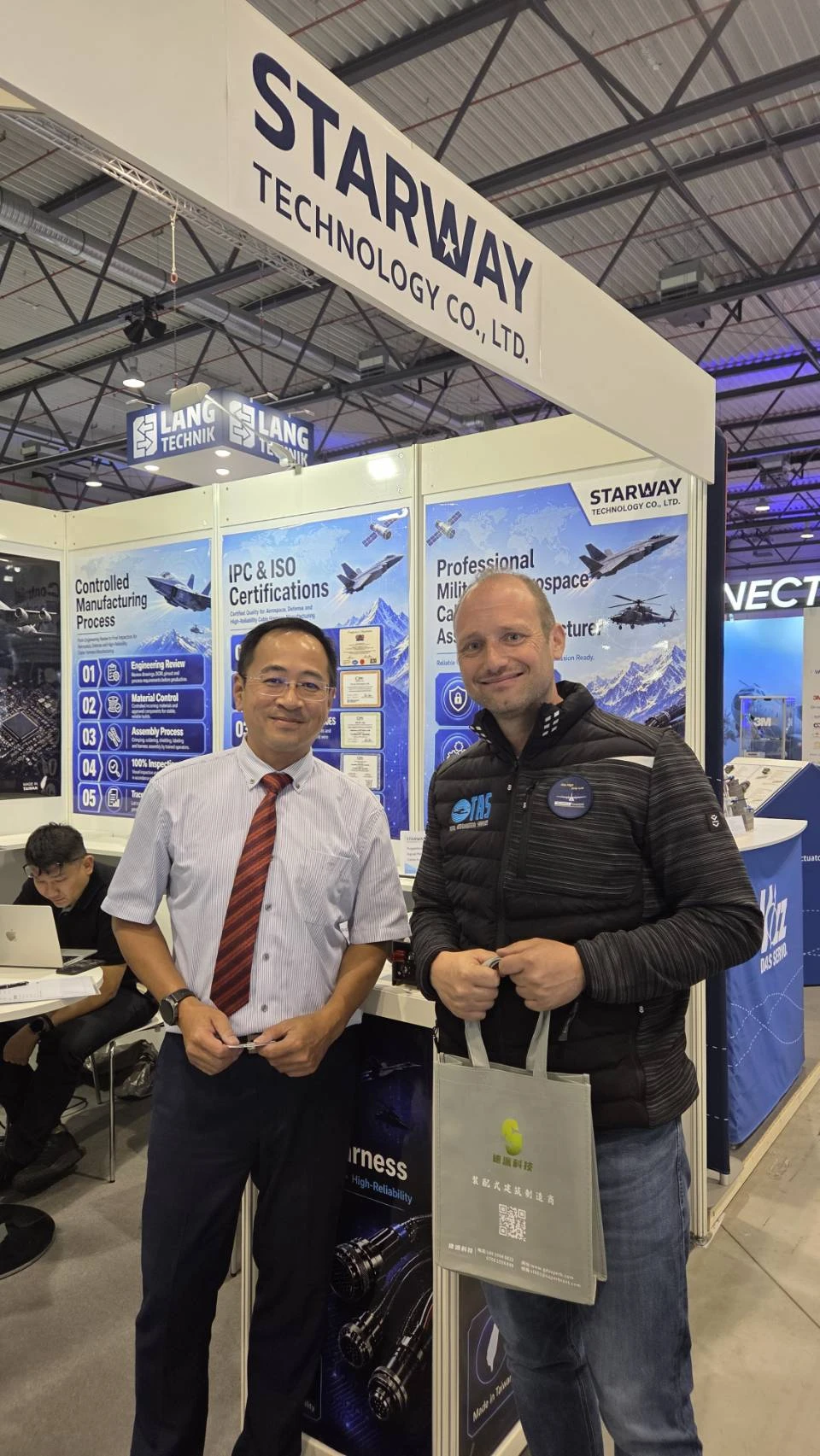 Starway Technology discussing cable assembly applications with an international customer