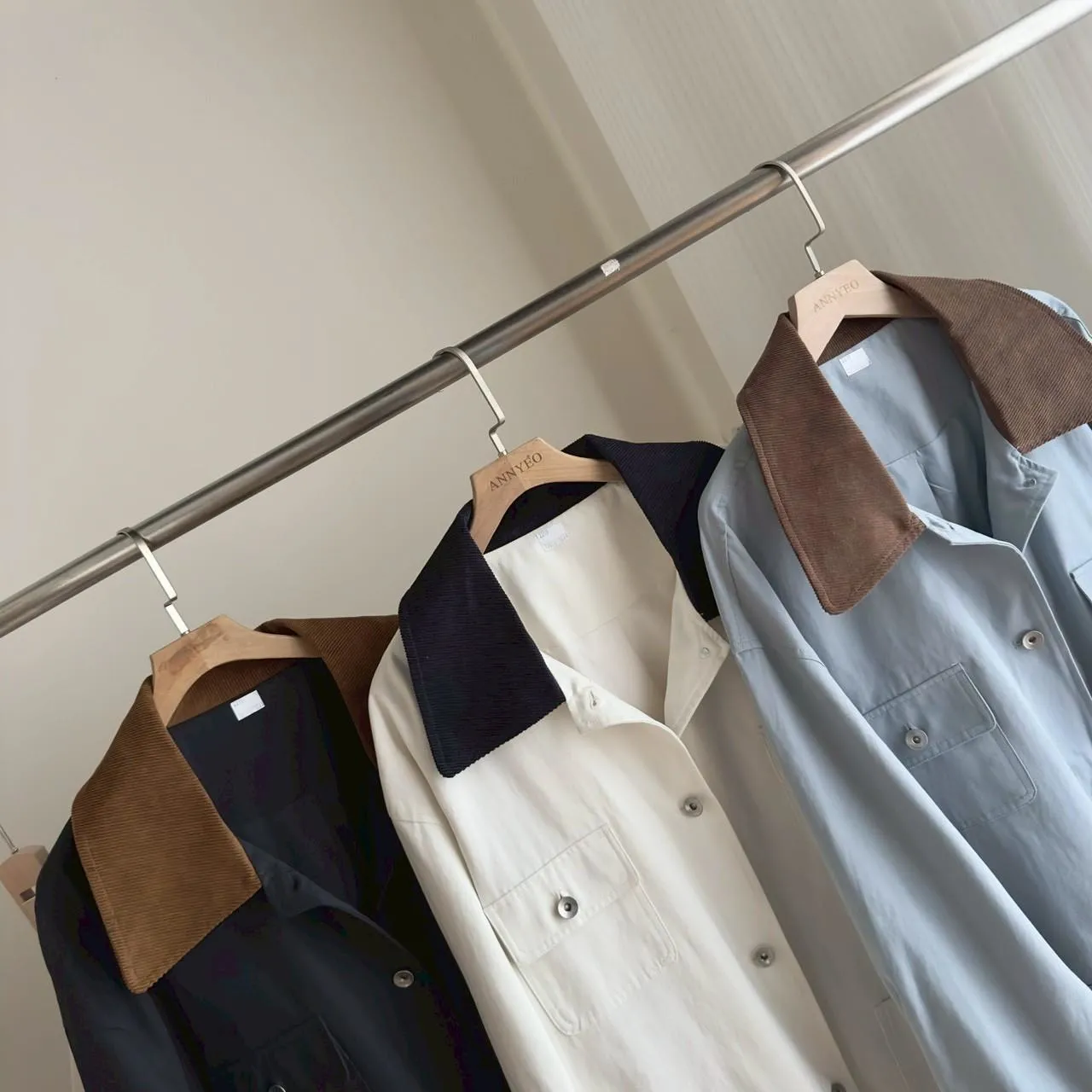 四口袋撞色領中長外套