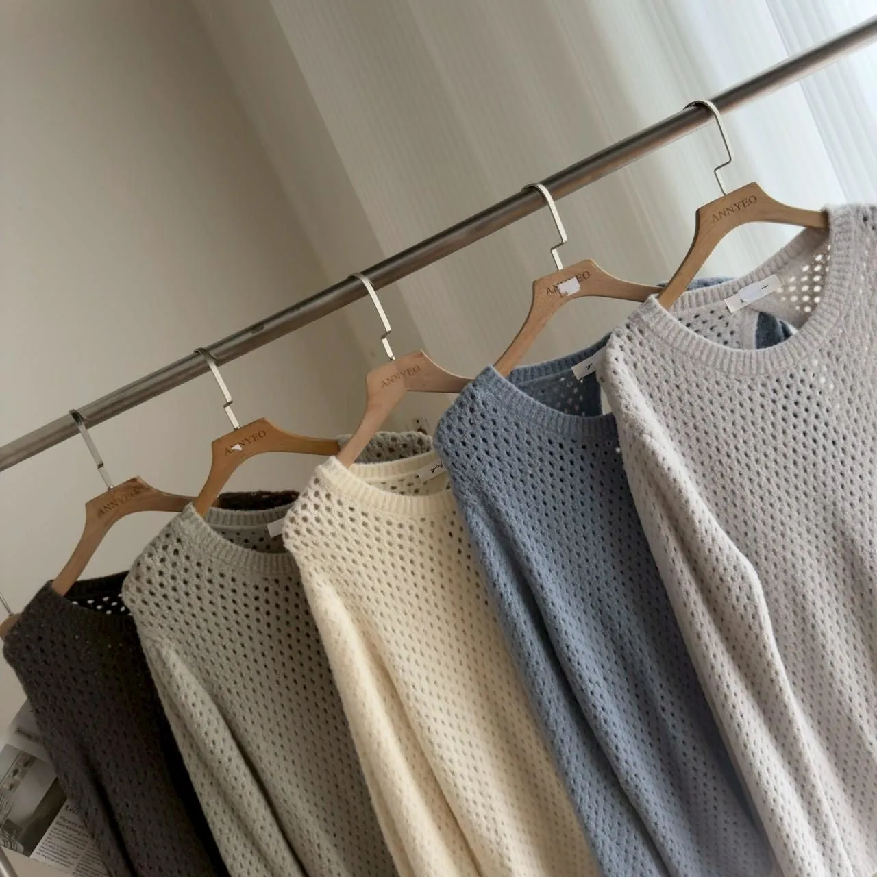 奶糯糯洞洞毛衣