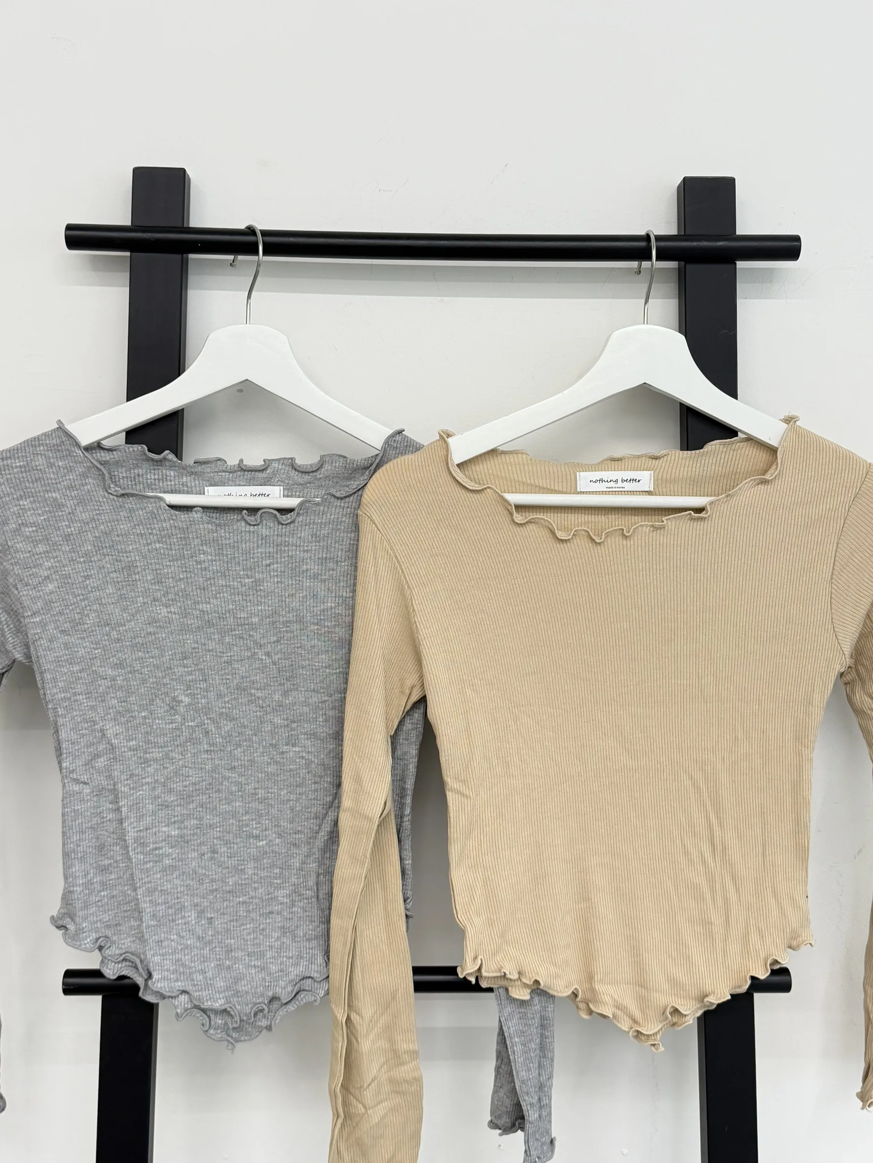 正韓羅紋木耳邊下擺修飾短款上衣