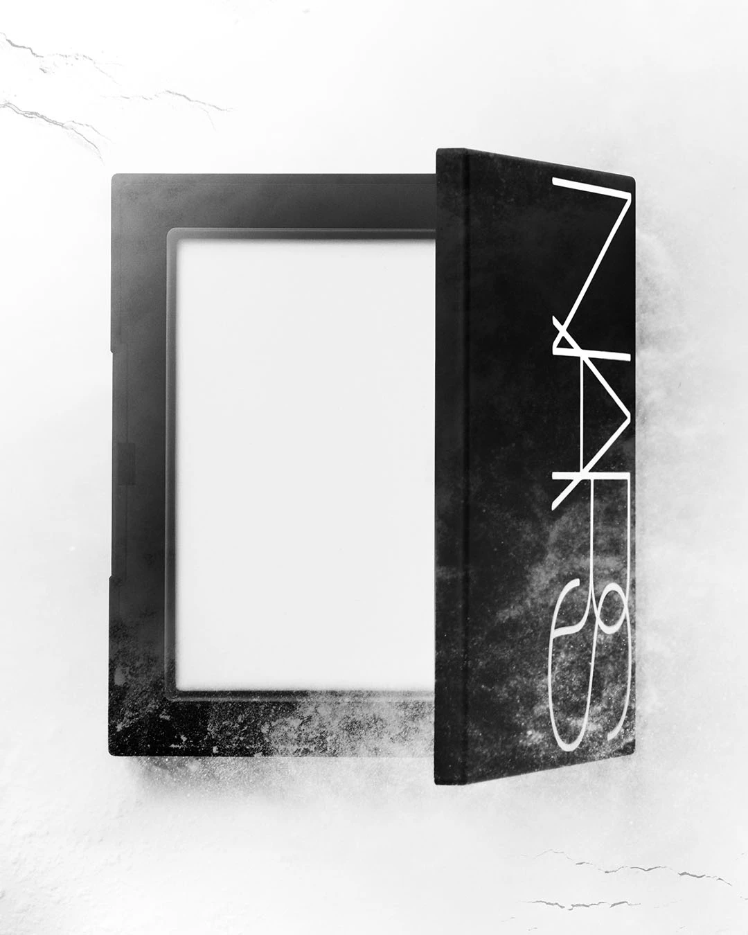 NARS 裸光蜜粉餅