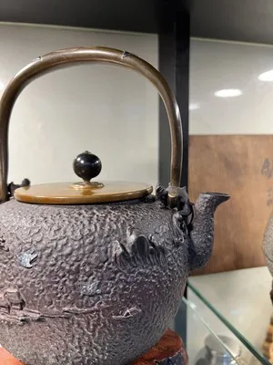 龜文堂造 家戌款 寶珠型銀象嵌波千鳥紋