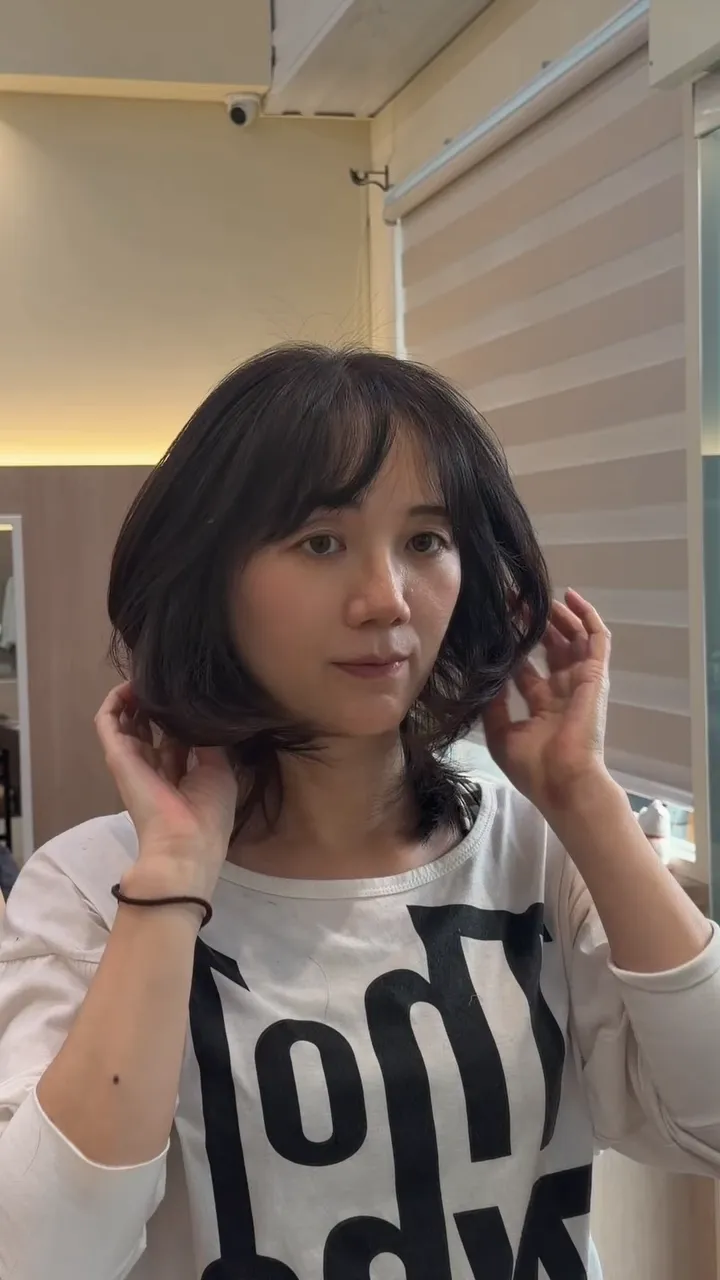 不是剪短而已 而是用層次讓頭型更立體