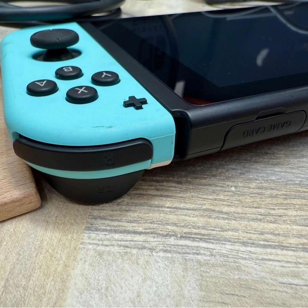 Switch 主機 電力加強版附遊戲片x1 無盒裝有配件