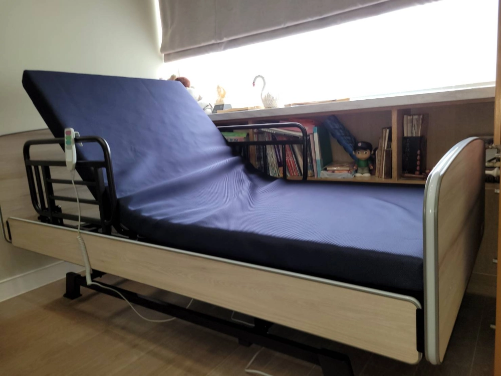 周先生選用暖心電動床輔助88歲周嬤嬤起臥床